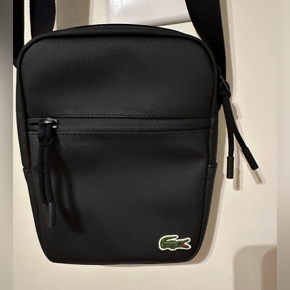 Lacoste crossbody bag. Purchased in Paris, France. Nwot